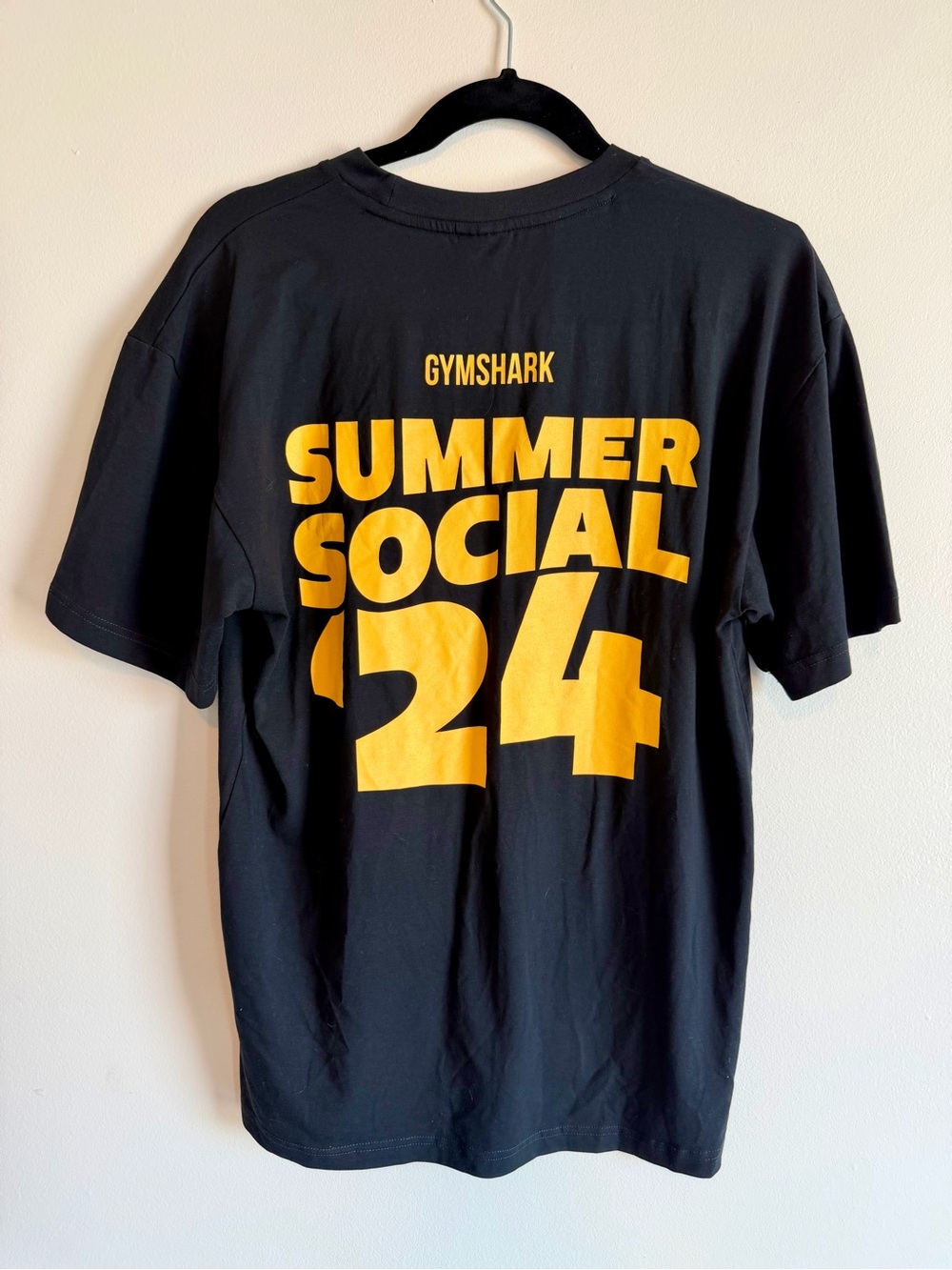 Rare Gymshark Black Tee with Bold Yellow "Summer Social '24" Graphic